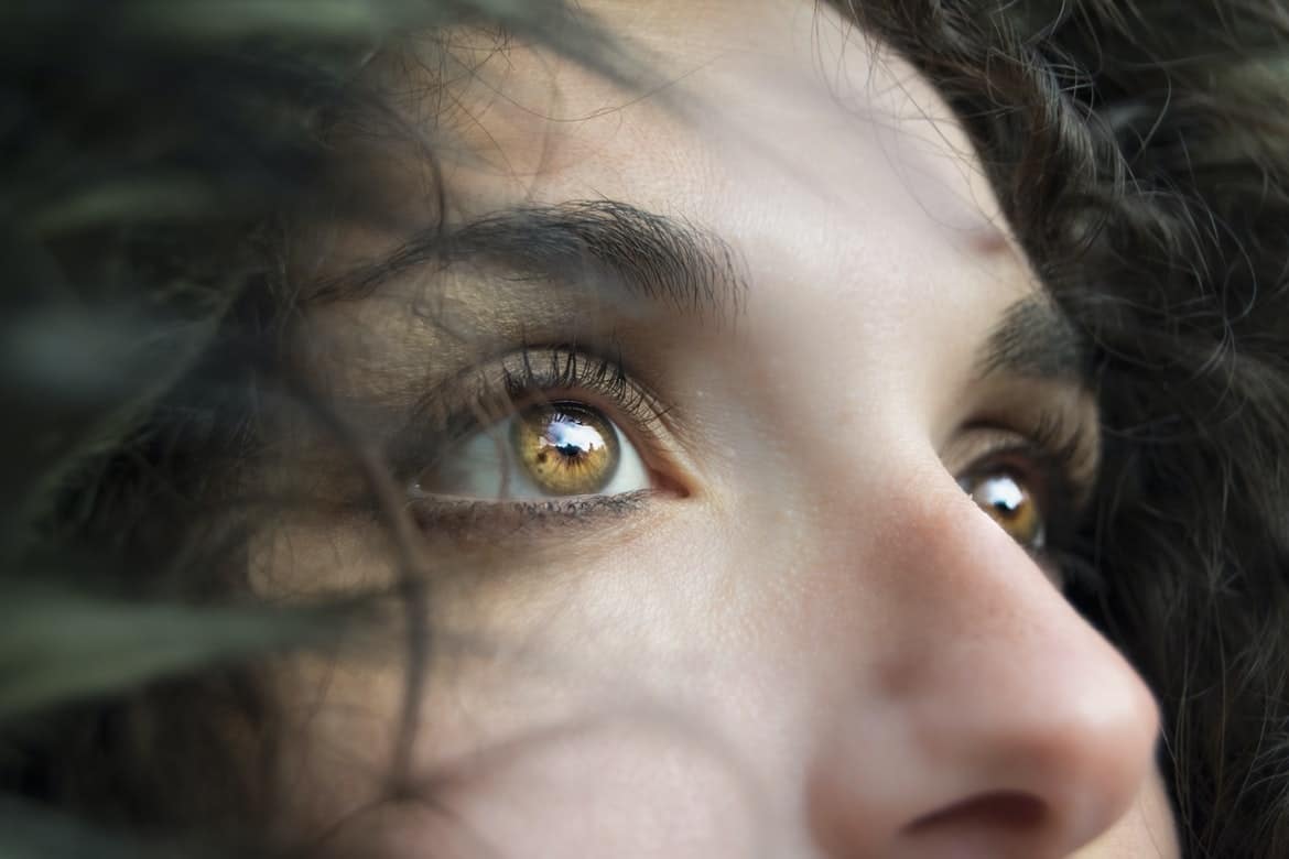 A closeup of a woman's eyes and nose.