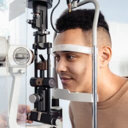 Young man getting an eye exam.